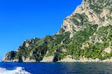 Fototapeta na wymiar Magnificent landscapes of the island of Capri from the sea.