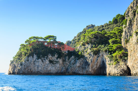 Capri Island. Magnificent view from the sea on the rocky shores of the island of Capri and Villa Malaparte. Built in the early 20th century, this restored Italian Modern home now hosts cultural events