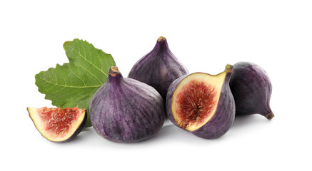 Tasty whole and cut figs with green leaf isolated on white