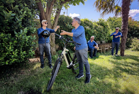 Digital composite of a man preparing for bicycle training, France