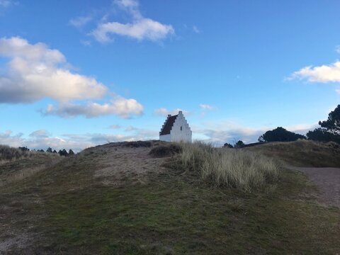 Tower of The Buried church (Den Tilsandede Kirke) in the sand dunes, Skagen, Jutland, Denmark