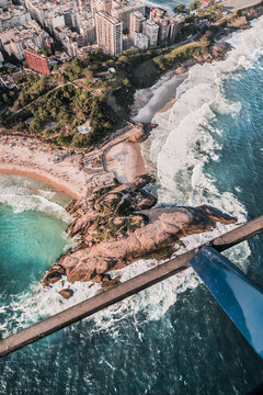 Aerial View Of Arpoador Rock, Ipanema And Diabo Beach Taken From A Helicopter In Rio De Janeiro, Brazil