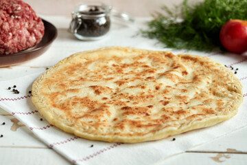 National traditional Caucasian food: Ossetian pies, khachapuri, chudu