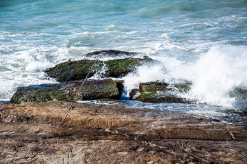 waves breaking on rocks