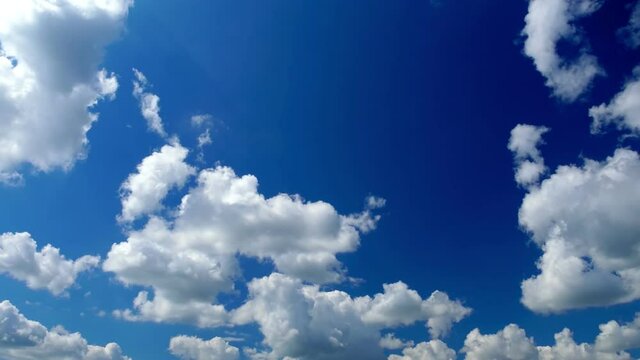timelapse, Fantastic white clouds. beautiful, fluffy, running clouds against the blue sky.