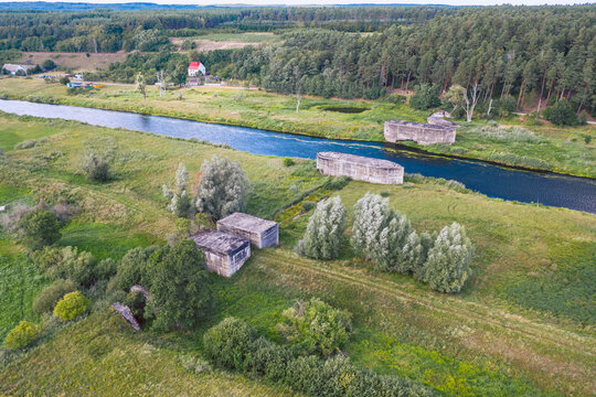 Aerial view over historical german dam combined with a railroad embankment built in 1938 for defense purposes. Drezdenko / Poland. 
