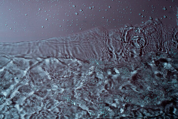 splash of water on a gray-green background. Abstract wallpaper