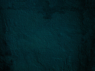 Green concrete wall is a decorative or textured surface. Can be used as a background or for design purposes