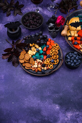 Halloween cheeseboard with blue and red cheese