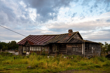 Fototapeta na wymiar landscape of the north island at dawn against the background of ancient houses
