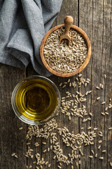 Peeled sunflower seeds and oil.