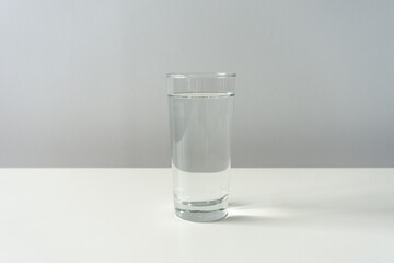 Isolated clear glass of water on clean background