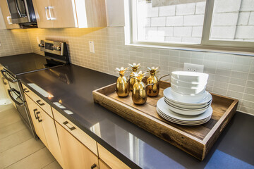 Wooden Serving Tray On Long Kitchen Counter