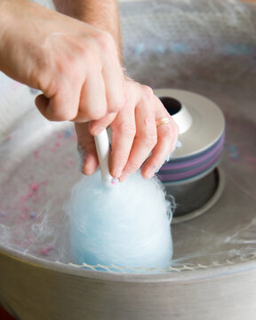 Hands Making Cotten Candy Close-up