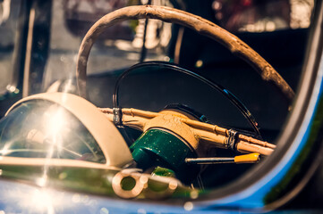 Old steering wheel on the car