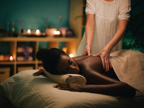African Woman Enjoying a Massage