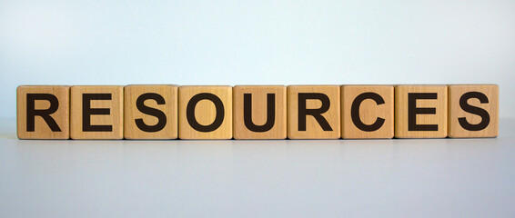 Word 'resources' on cubes on a beautiful white background. Business concept, copy space.