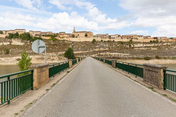 Fototapeta na wymiar the bridge over Riaza river (Linares reservoir) going to Maderuelo medieval village, province of Segovia, Castile and Leon, Spain