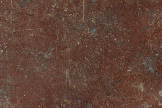 Brown workshop floor with clear signs of use, scratches and spots of paint used job workspace background abstract floor, woodworking, broken, worn