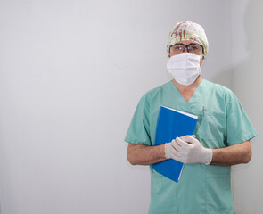 Portrait of adult man doctor or nurse in a hospital.