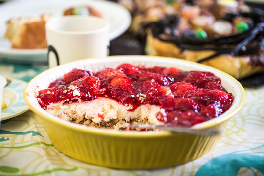 Strawberry cheesecake in yellow flan dish