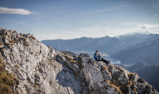 father and son on top of a mountain