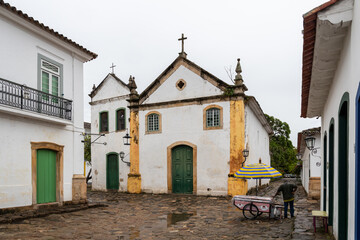 Fototapeta na wymiar Colonial portuguese church in a street of the historical village of Paraty, in Brazil