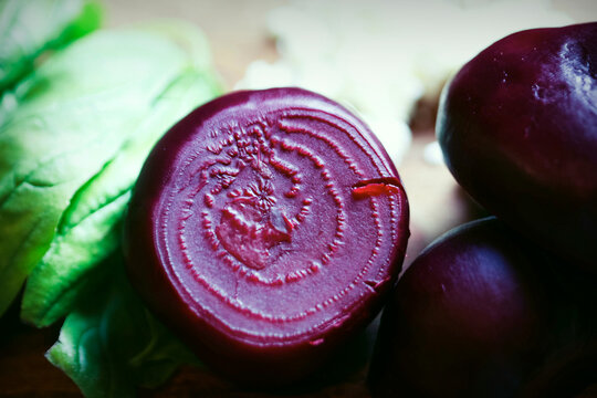 Close up of a sliced beet and basil