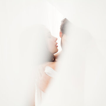 Couple hugging in the morning foreplay.