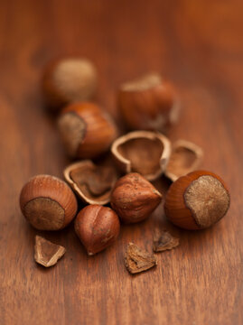 Hazelnuts on wood surface