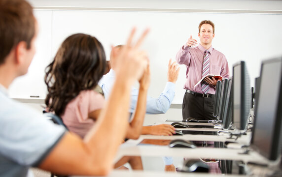 Computer Class: Teach Calls On Student