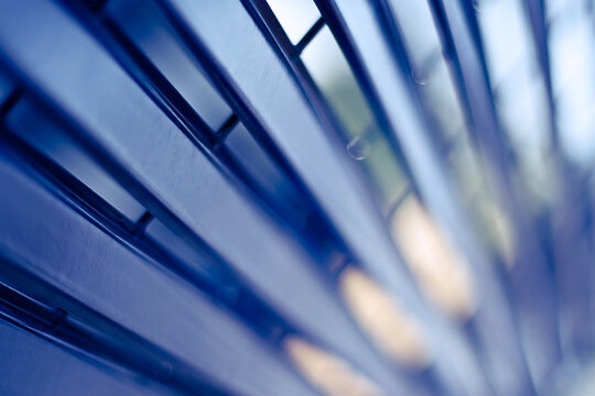 Abstract of lines from metal grate on wall