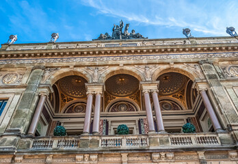 Beautiful façade of the Royal Danish Theatre (Det Kongelige Teater) performing arts venue built in the 19th century, in Kongens Nytorv square, Copenhagen, Denmark.