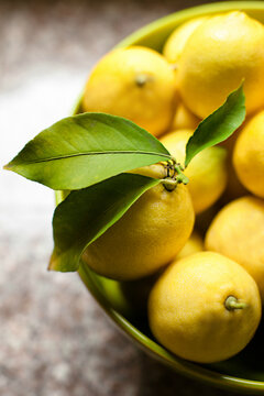 Large bowl of organic lemons