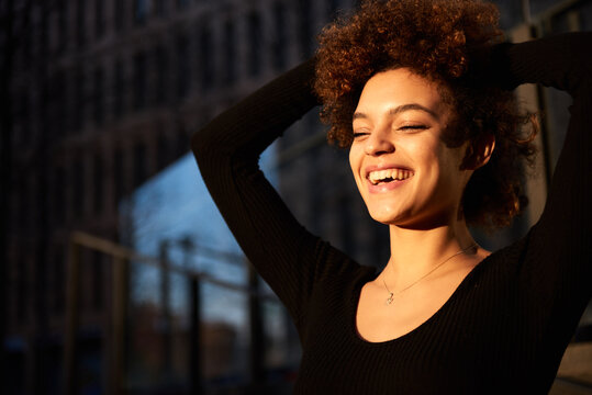 Attractive smiling woman with afro
