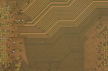 Gold circuit board background of computer motherboard