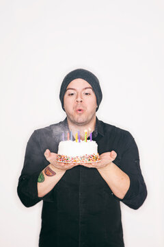 Celebrate: Man Blows Out Birthday Candles