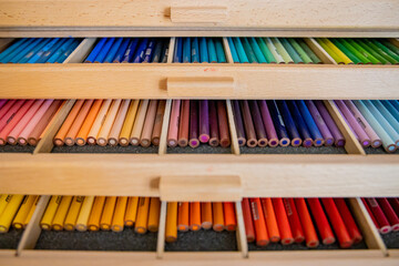 colored pencils in a box