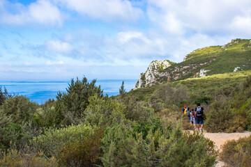 tourists on a mountain trail
