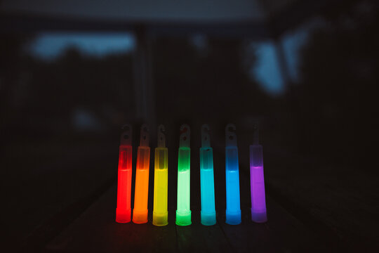 A rainbow of glow sticks - Powered by Adobe