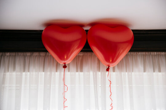 2 red heart balloons for Valentine's day