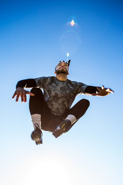 African American athlete training on a football field