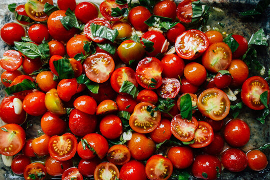 tomatoes and herbs in olive oil