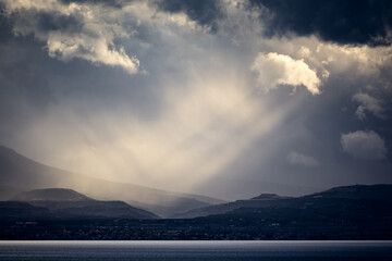 Sun Rays Through Turbulent Sky