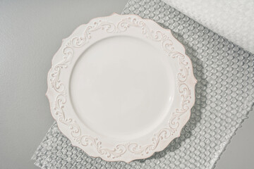 Ceramic Plate Being Packed for Shipping