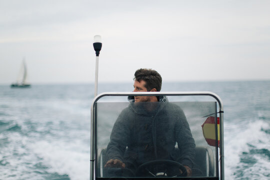 man floating in a boat