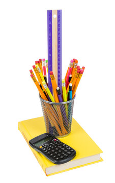 Pencils Calculator and Book Isolated