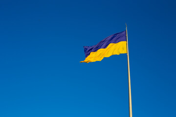 National flag of independent Ukraine waving in the wind