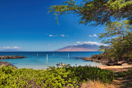Kihei boat ramp on a bright sunny day with Ko'olawe island in the distance.