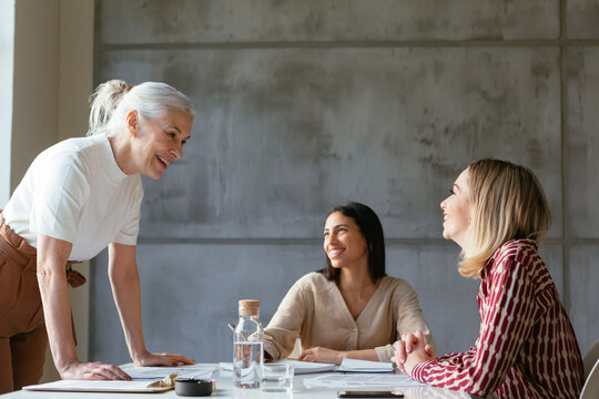 Friendly women working on project together